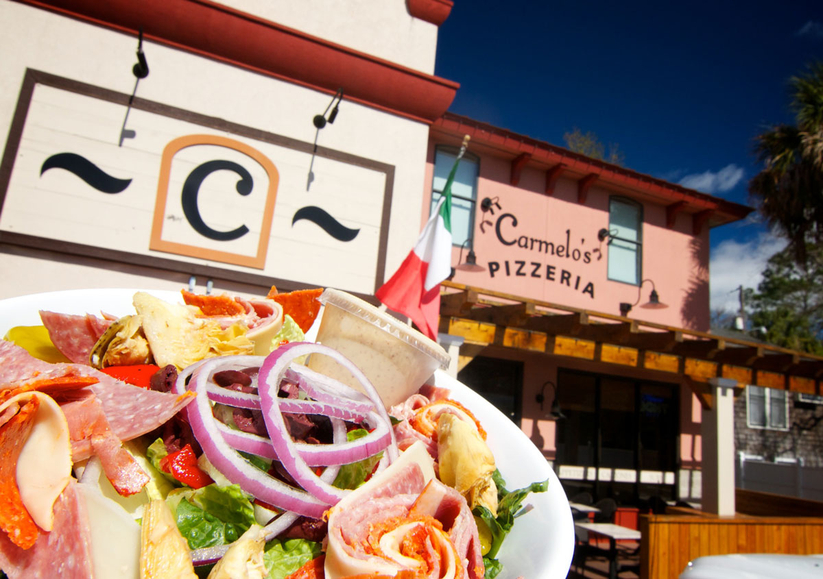 Carmelo's outside with salad in foreground